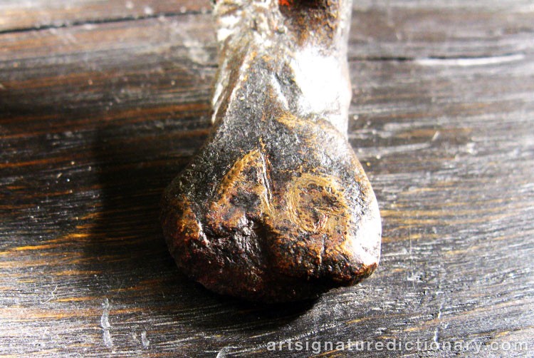 Close-up details showing Alberto GIACOMETTI signature forgery characteristics